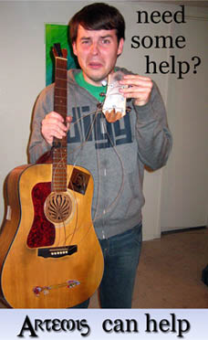 picture of a man needing guitar repairs